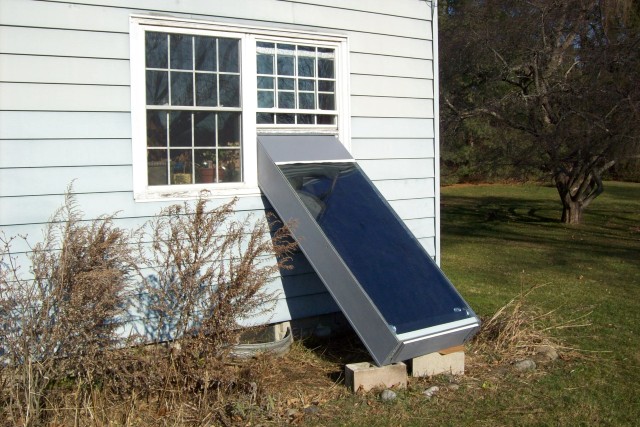 LOAD IMAGES - PHOTO OF a REAL Solar Heater in Window
